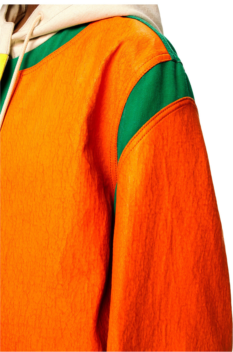 Coated parka in denim 5