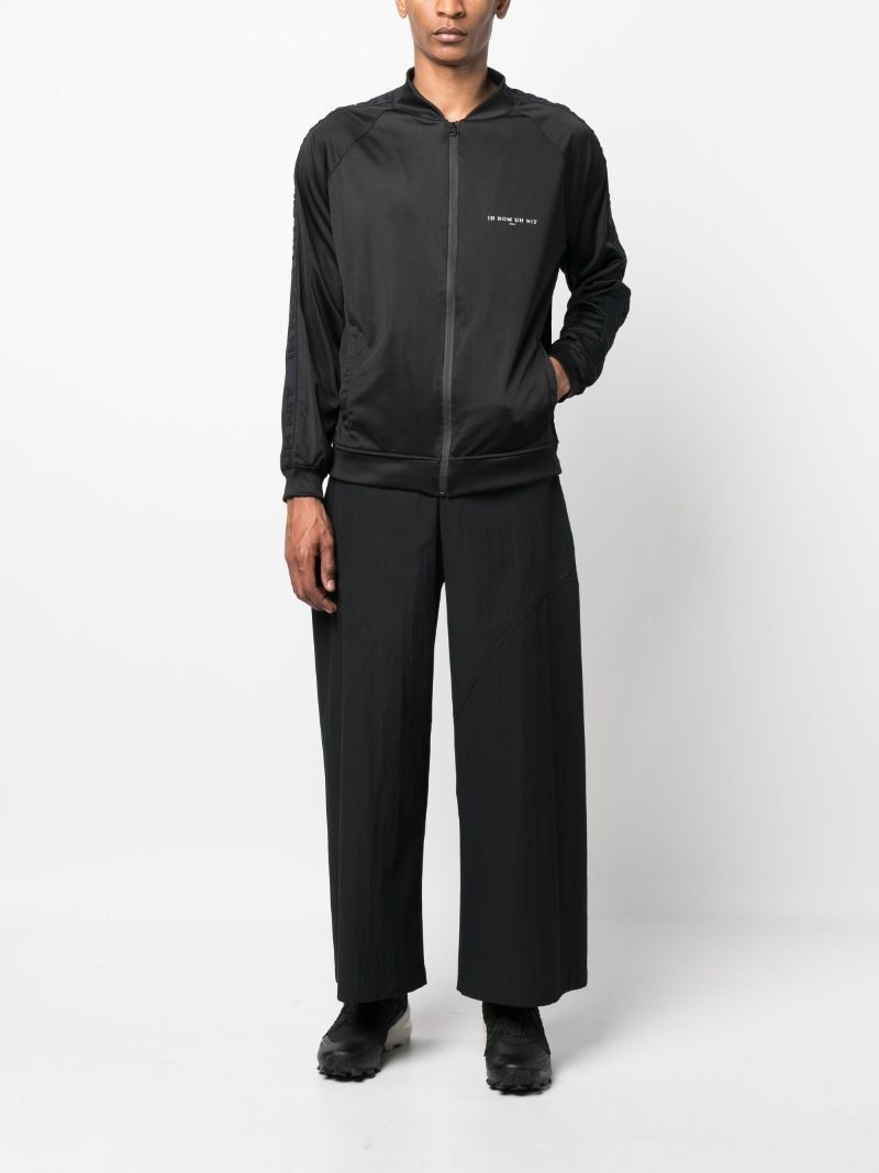 ih nom uh nit logo-print zip-up sweatshirt outlook