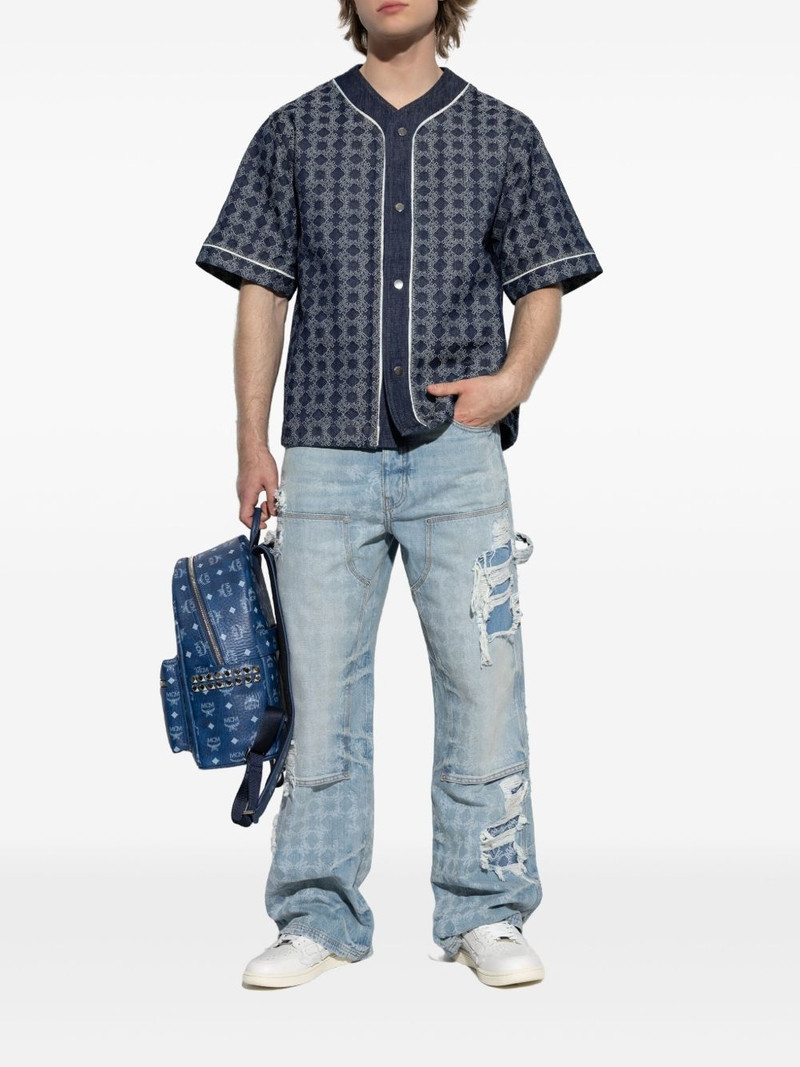 AMIRI distressed patchwork jeans outlook