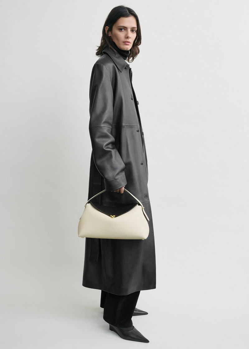 TOTEME T-lock embroidered leather top handle black/milk outlook