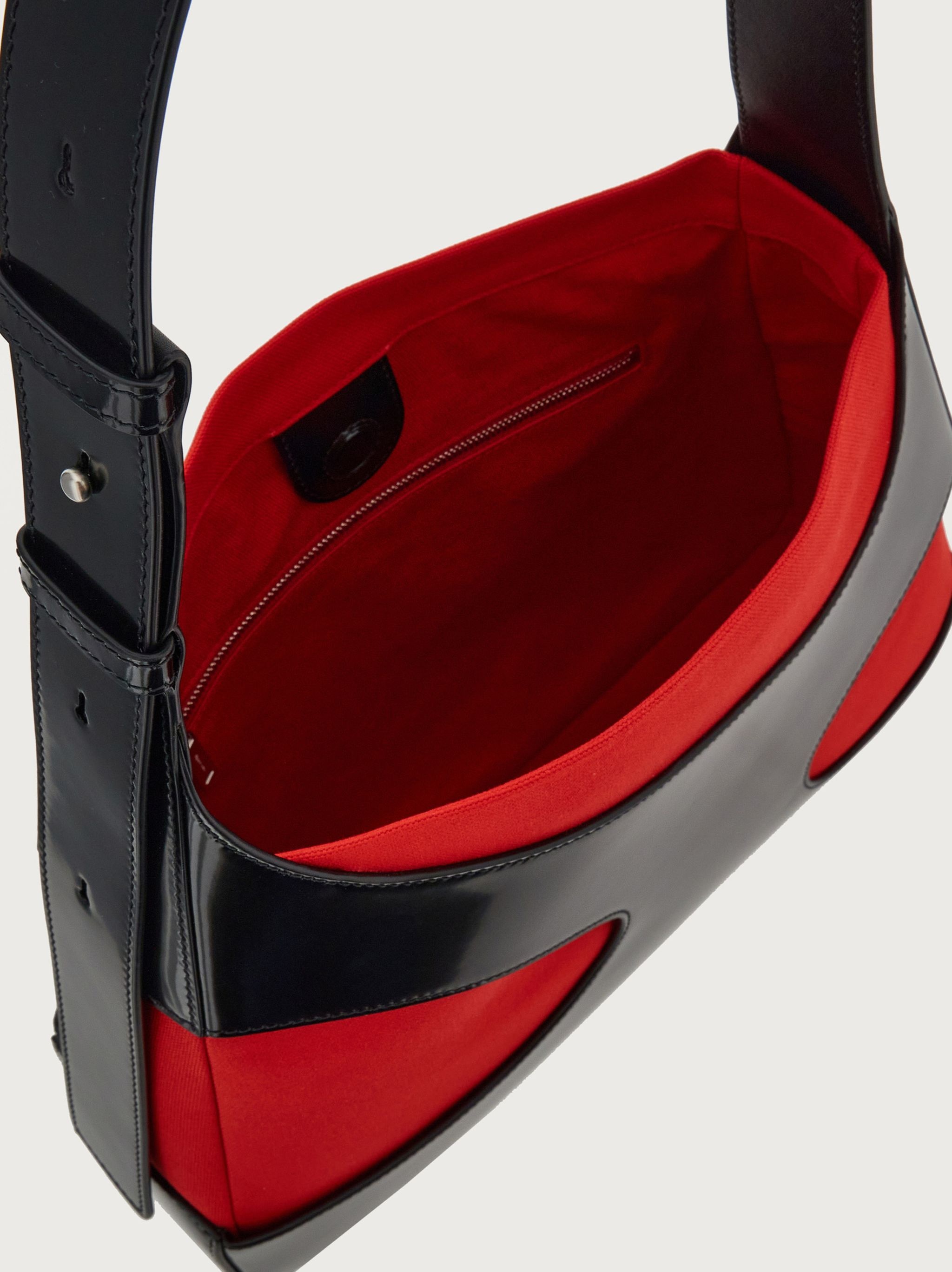 FERRAGAMO Shoulder bag with cut-out detailing (L) | REVERSIBLE