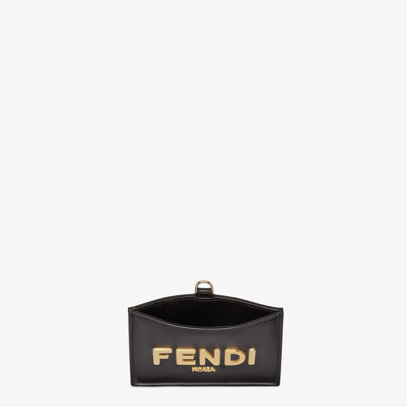 FENDI Fendi Roma name badge with a flat pocket and metal chain. Made of black leather. Gold-finish metalwa outlook