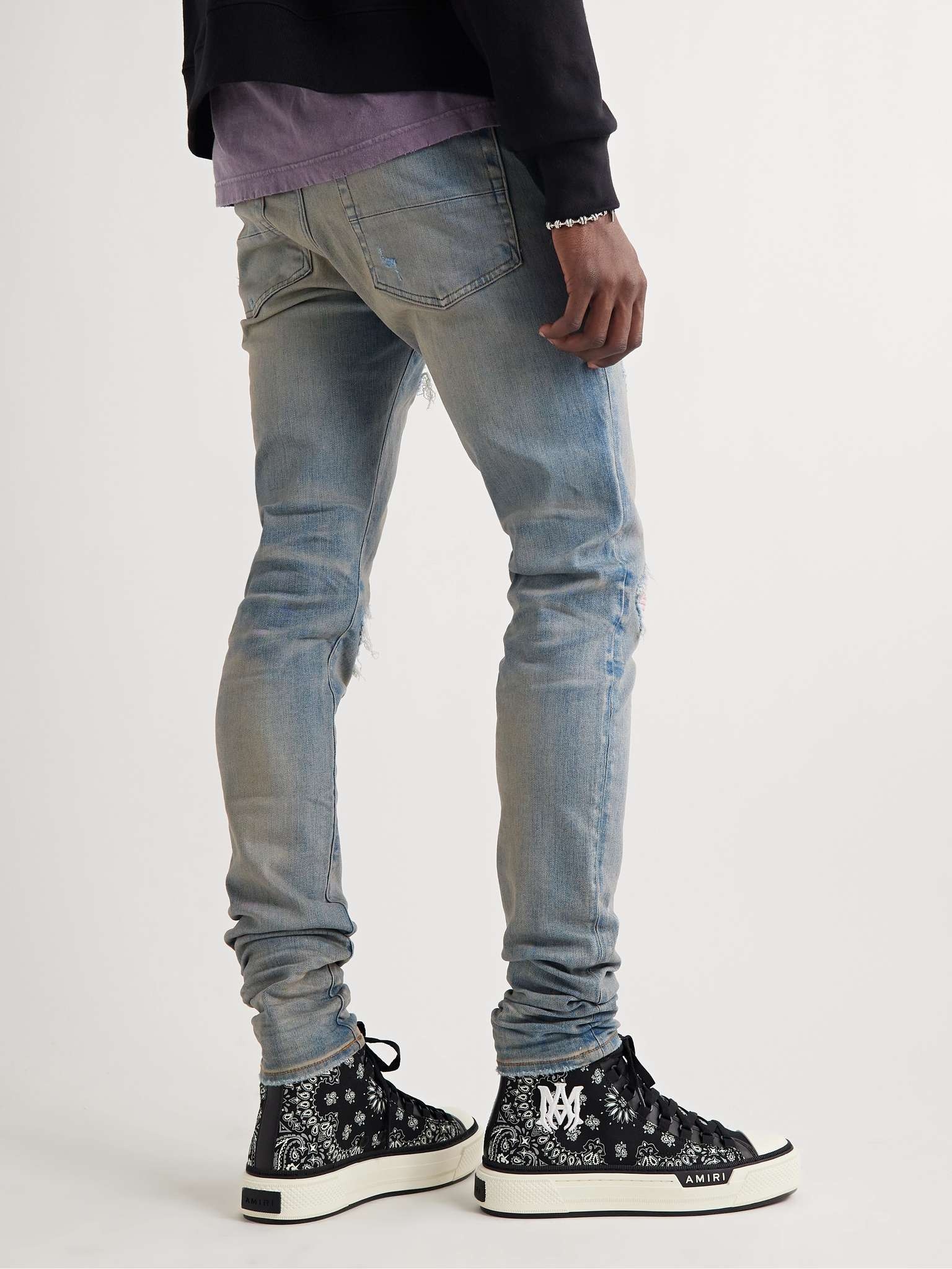 AMIRI MX1 Skinny-Fit Ultrasuede®-Panelled Distressed Jeans AMIRI MX1 Skinny-Fit Ultrasuede®-Panelled Distressed Jeans
