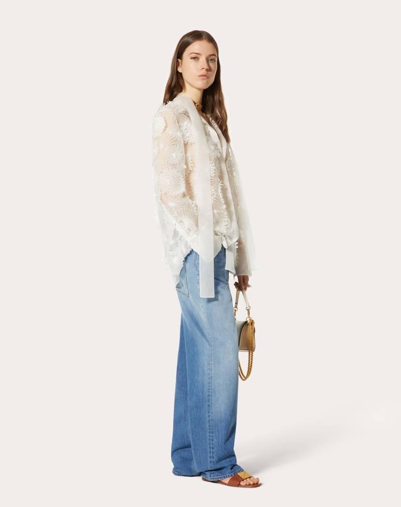 Valentino BLUE WASHED DENIM JEANS WITH VALENTINO ARCHIVE 1985 PRINT outlook