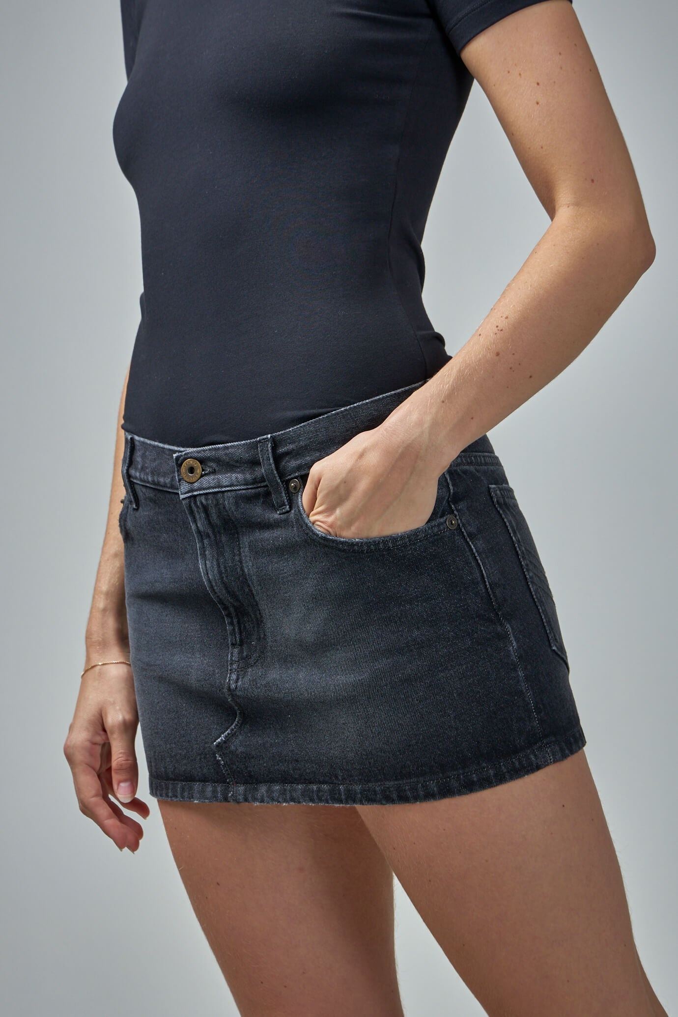 Denim Mini Skirt with Leather Pocket - 4
