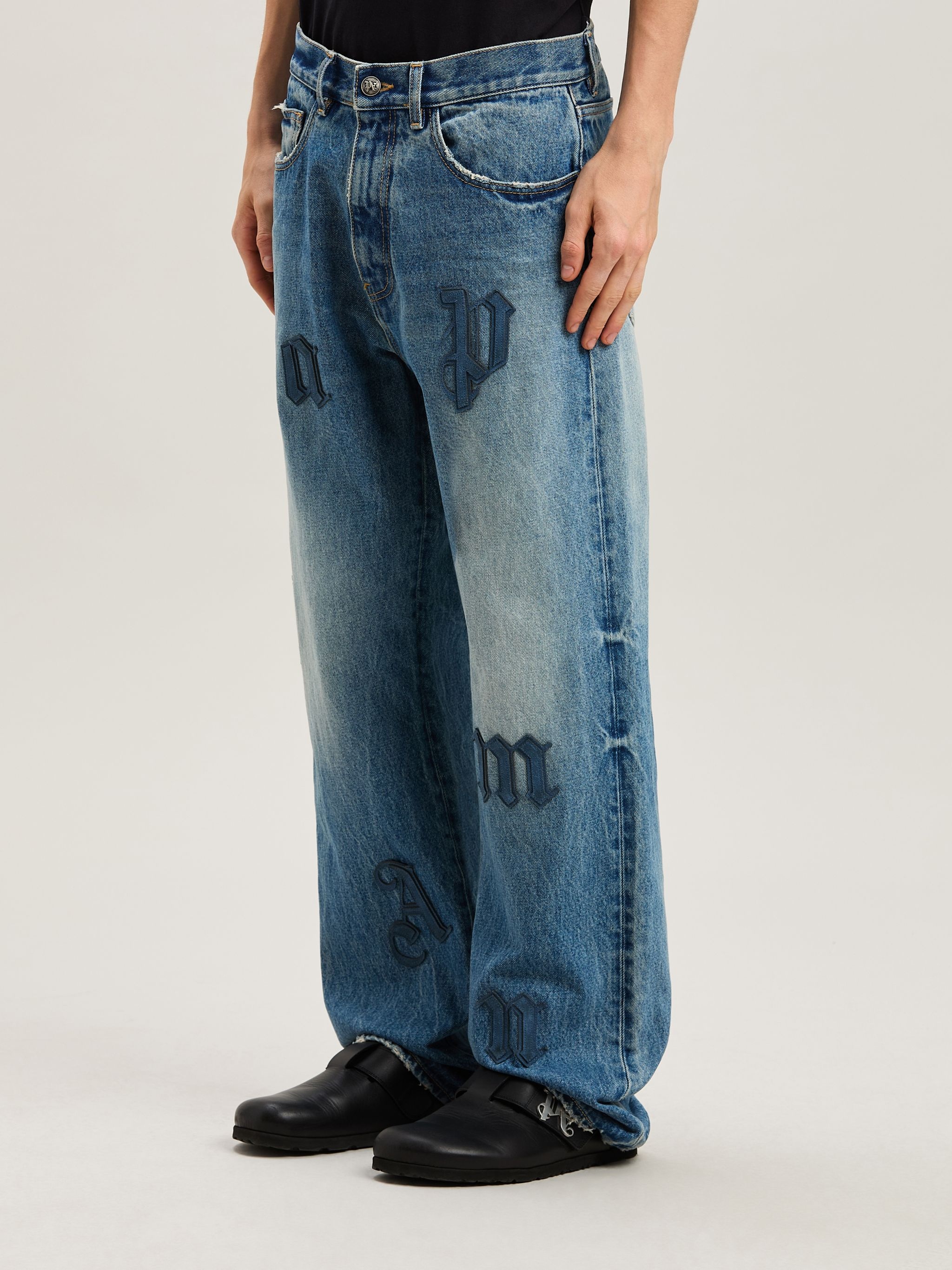 Logo Patch denim pants - 4