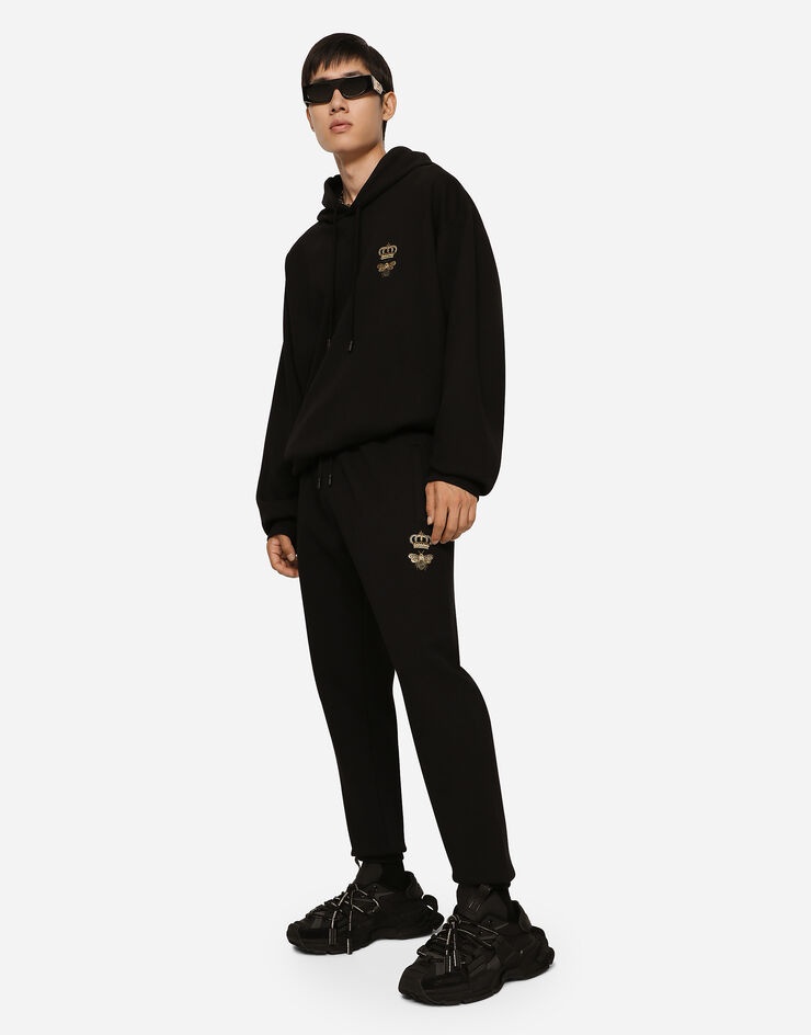 Jersey jogging pants with embroidery - 5