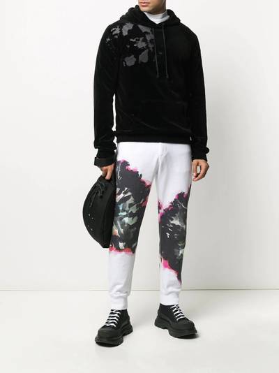 Alexander McQueen abstract print track pants outlook