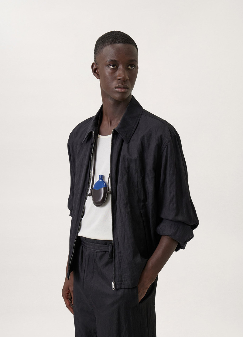 FLASK NECKLACE
VEGETAL TANNED LEATHER 1