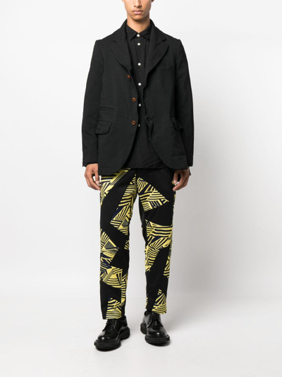 Comme des Garçons Homme Plus geometric-print panelled trousers outlook