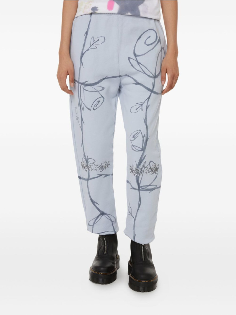 Collina Strada rose-print embellished track pants outlook