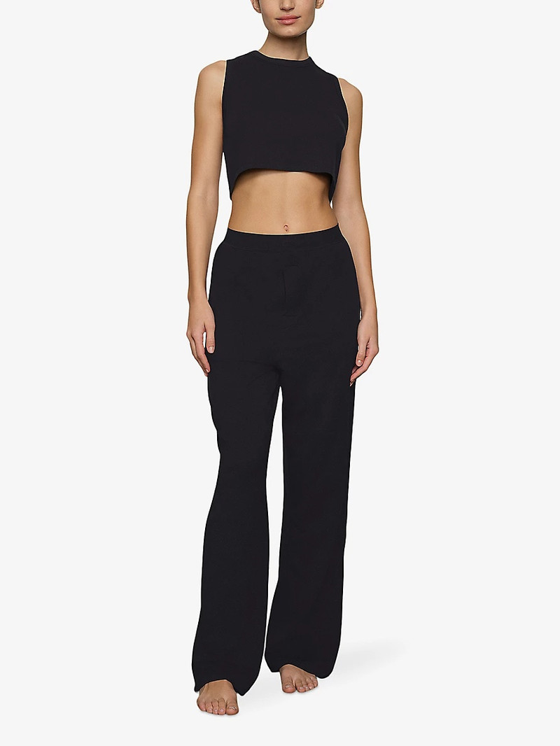 SKIMS Boyfriend relaxed-fit stretch-woven trousers outlook