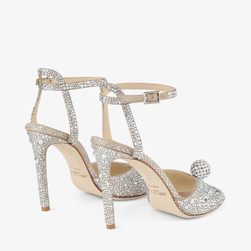 JIMMY CHOO Sacora 100
Nude Suede Sandals with Hotfix Crystals and Sphere Detail outlook