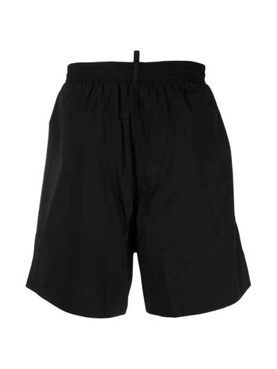 DSQUARED2 logo-print swim shorts outlook