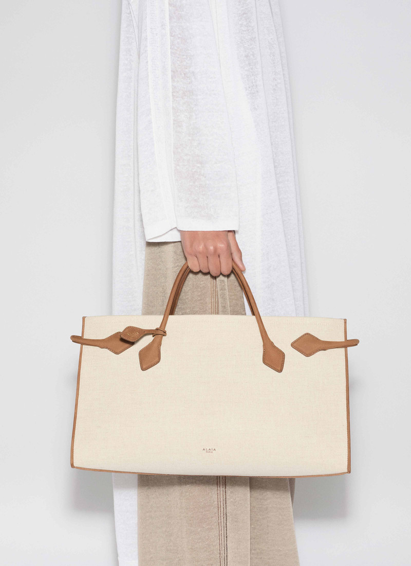 Alaïa LE TECKEL TOTE BAG IN CANVAS AND NUBUCK outlook