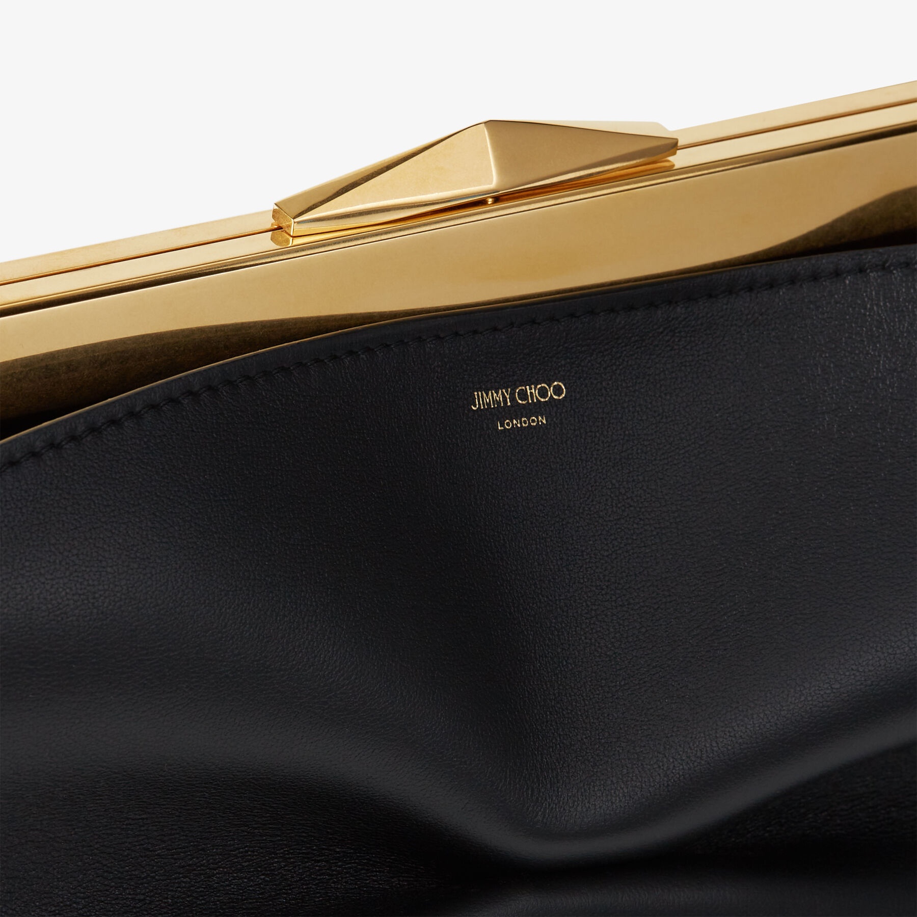 Diamond Frame Clutch
Black Soft Calf Leather Clutch Bag with Chain Strap - 7