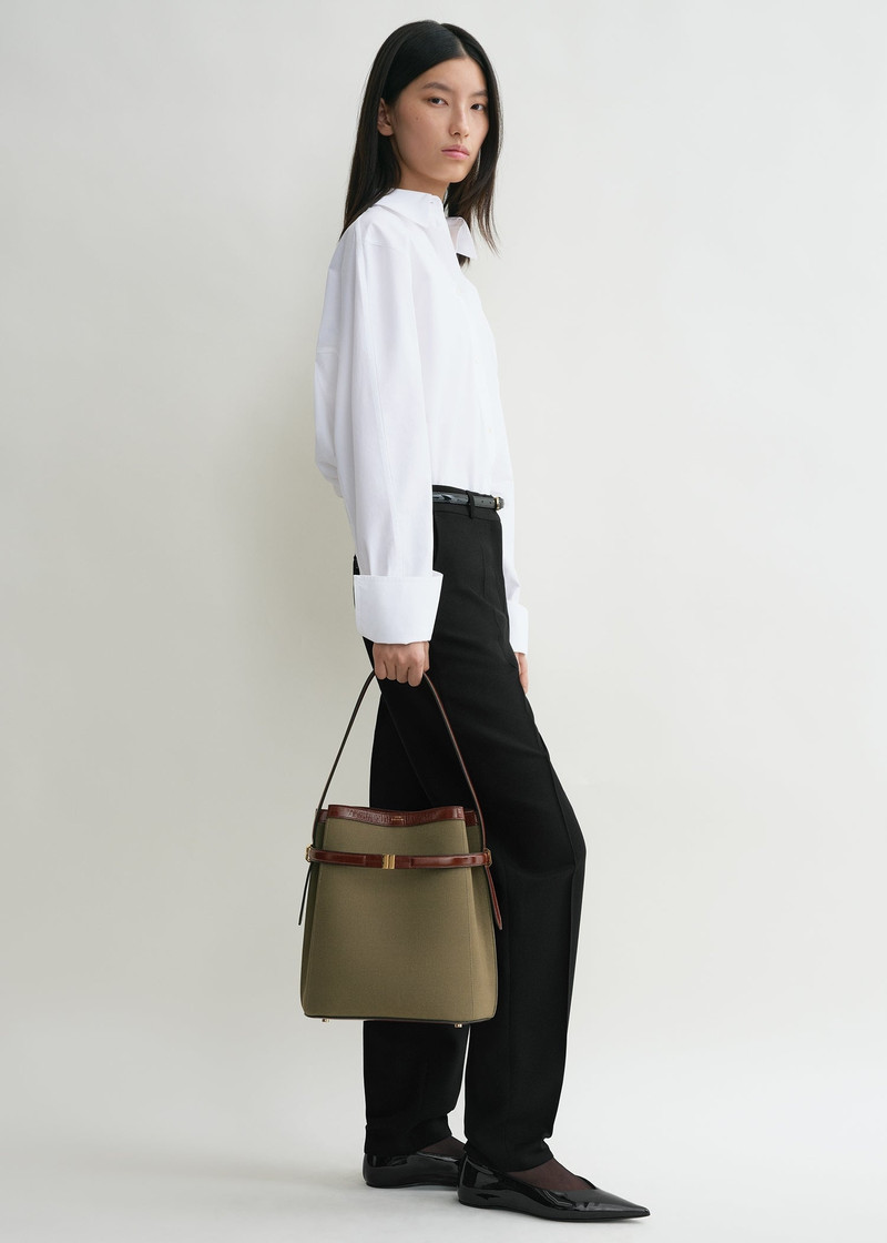 Totême Belted canvas bucket bag khaki green outlook