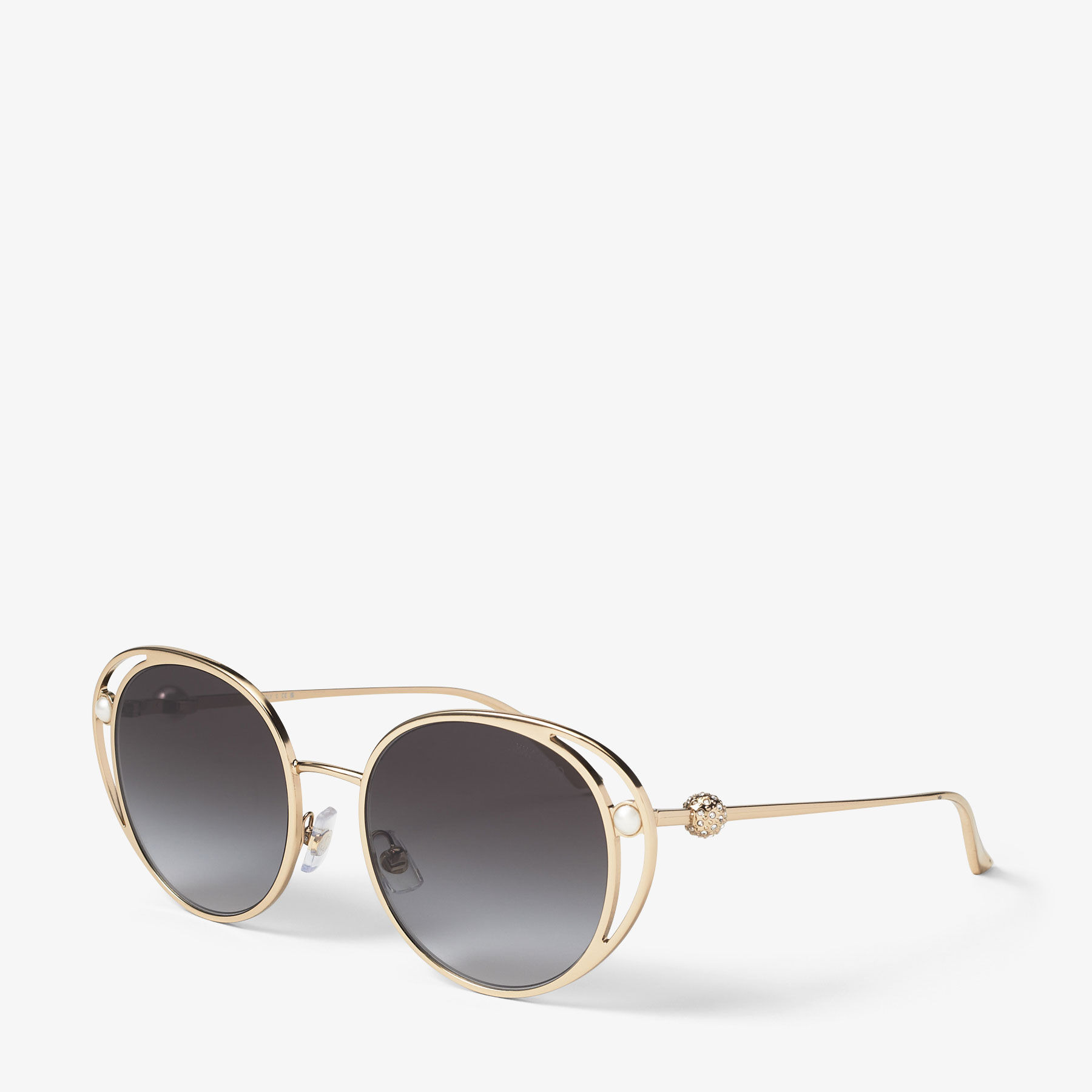 Angela
Pale Gold Oval Sunglasses - 2