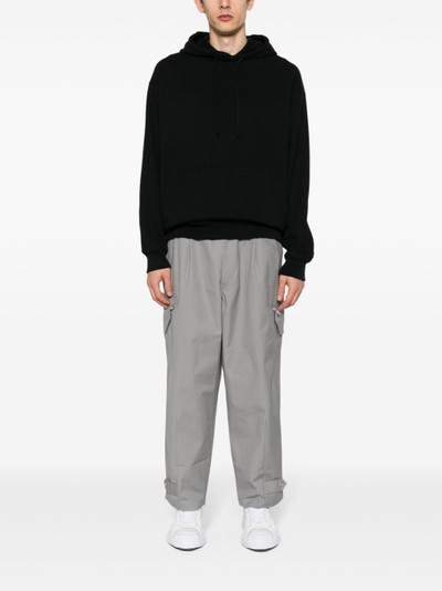 Y-3 logo-print canvas tapered trousers outlook