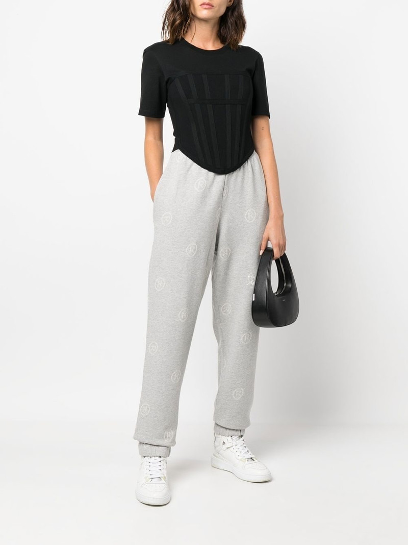 Martine Rose all-over logo-print track pants outlook