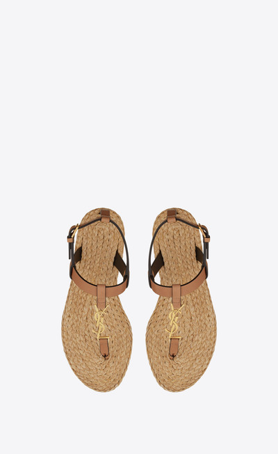 SAINT LAURENT cassandra flat sandals in vegetable-tanned leather with bronze-tone monogram outlook
