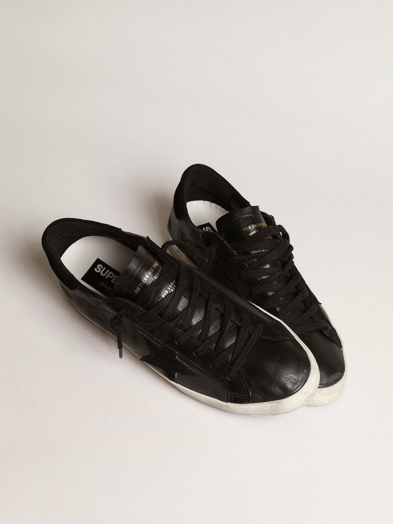 Golden Goose Super-Star in black nappa with black suede star and heel tab outlook
