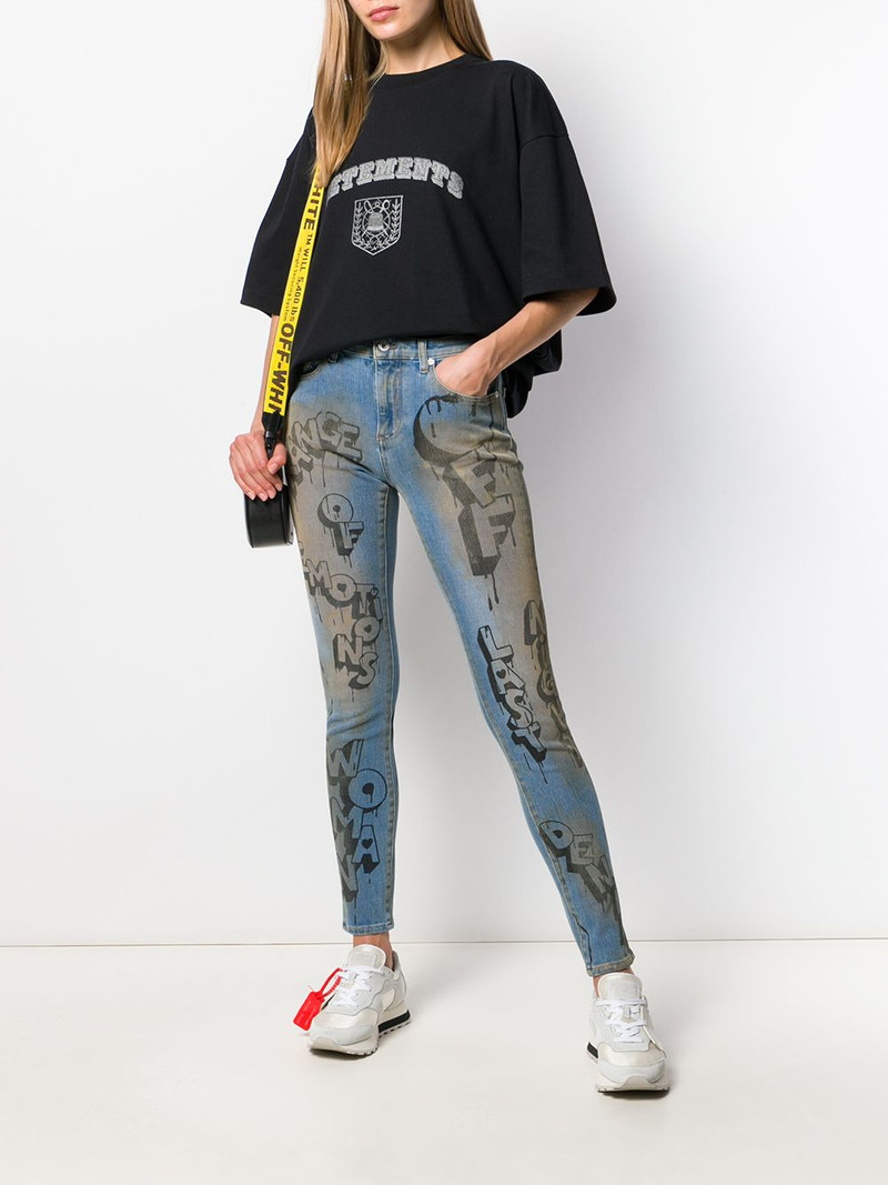 Off-White graffiti print skinny jeans outlook