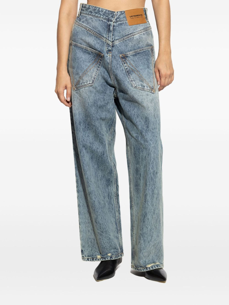 distressed V-yoke jeans 1