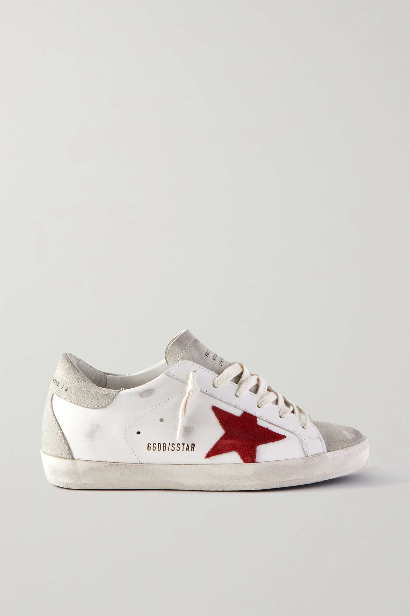 Superstar distressed leather and suede sneakers - 1