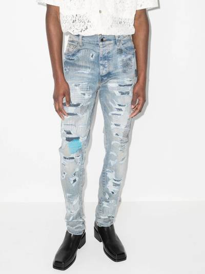 AMIRI distressed-finish skinny jeans outlook