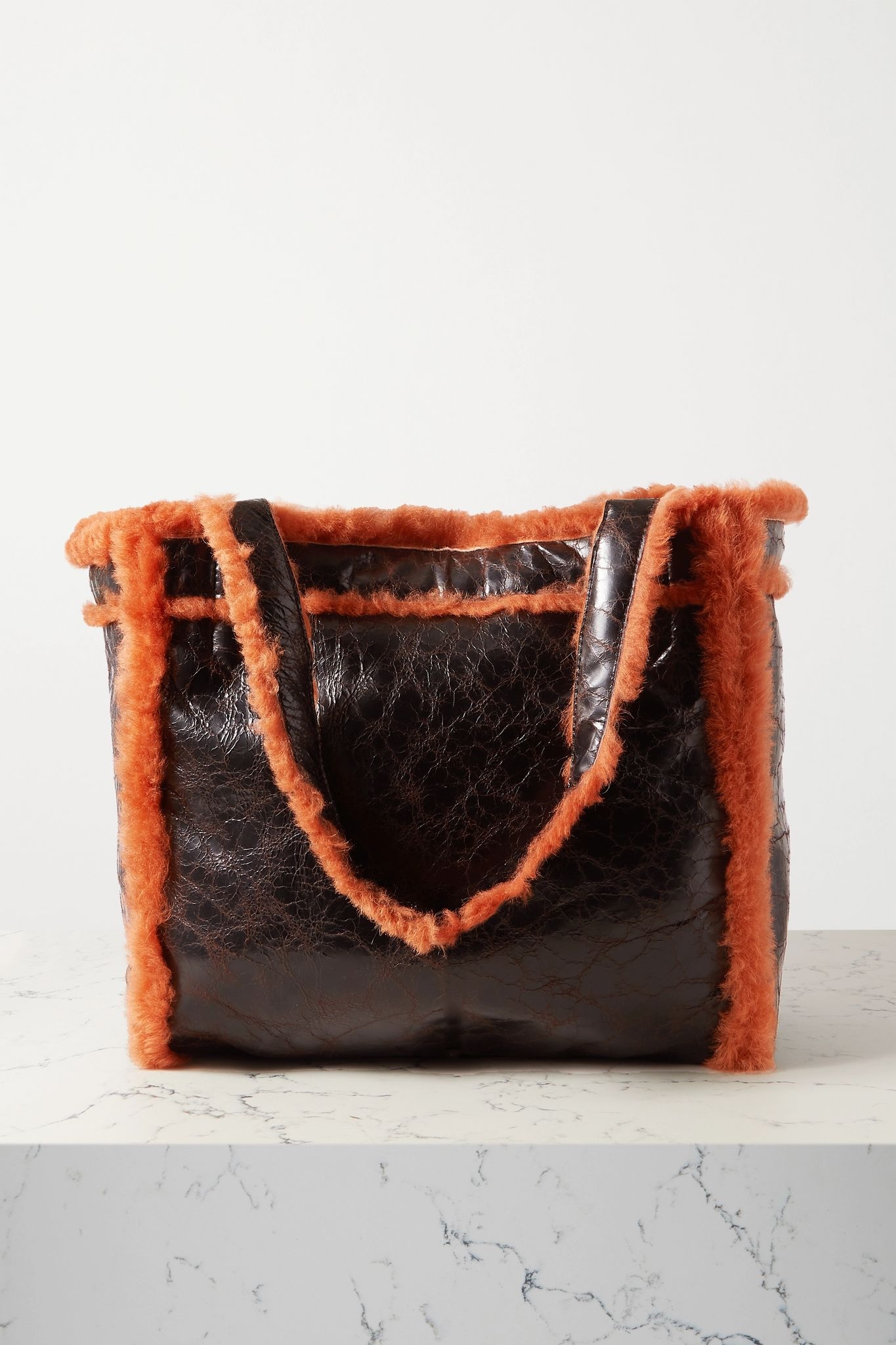 Reversible shearling and crinkled-leather tote - 1