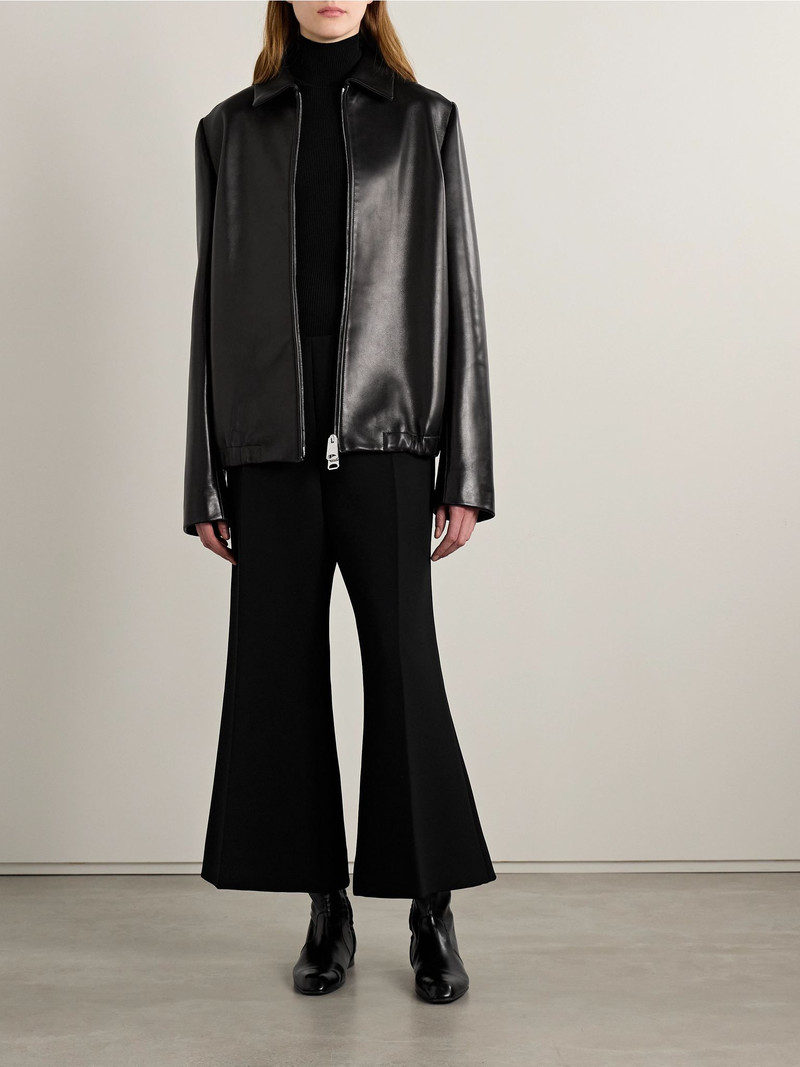 KHAITE Benita ribbed-knit turtleneck top Black outlook