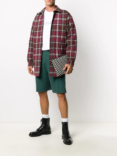 VETEMENTS slogan print track shorts outlook