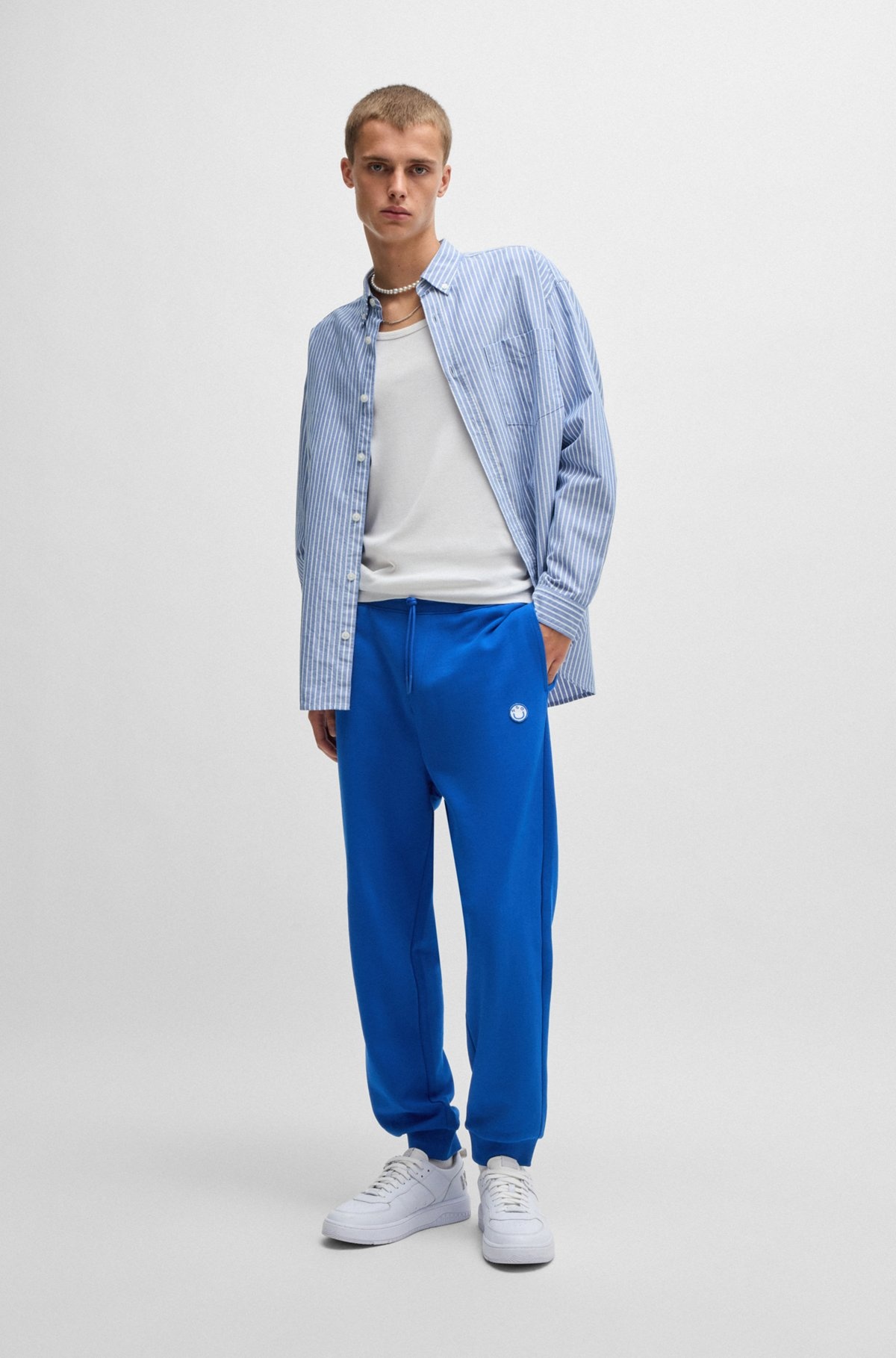 COTTON-TERRY TRACKSUIT BOTTOMS WITH HAPPY HUGO LOGO PATCH - 4