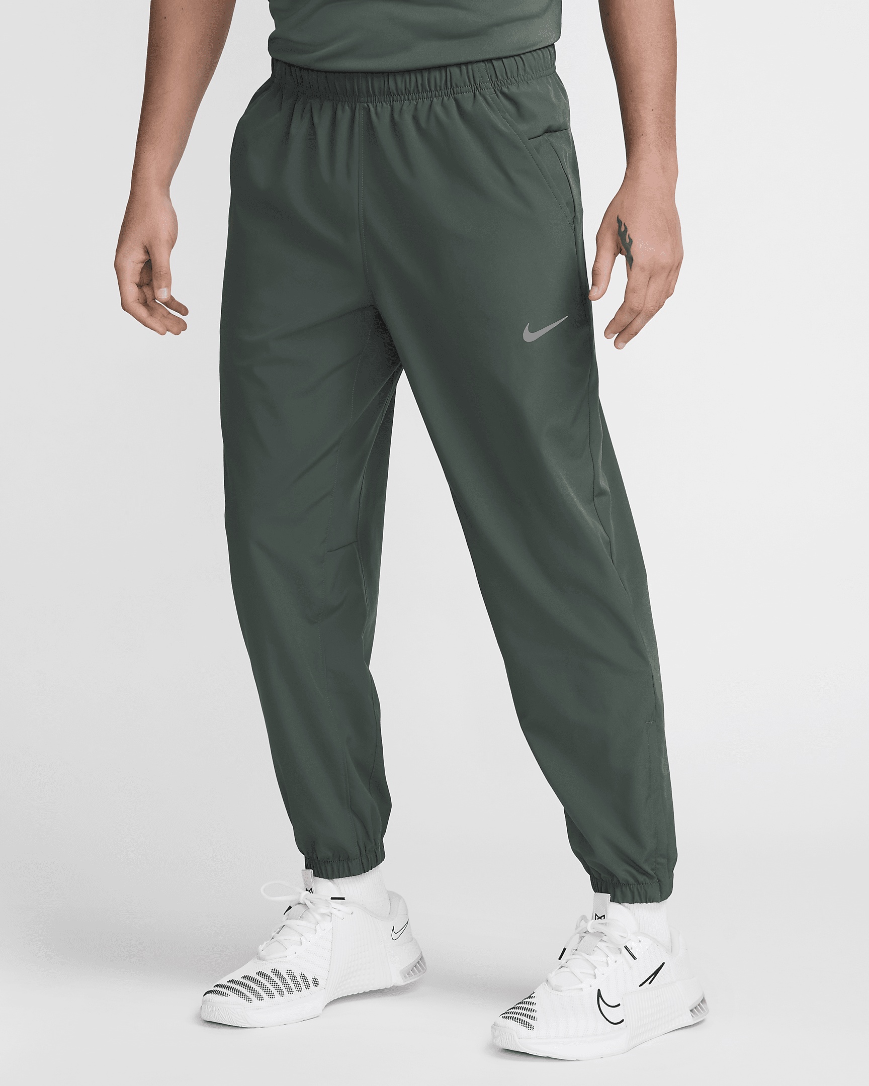 Nike Form Men's Dri-FIT Tapered Versatile Pants - 1