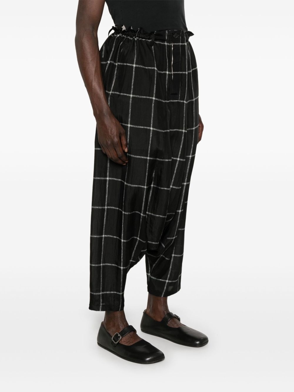 check-pattern drop-crotch trousers - 3