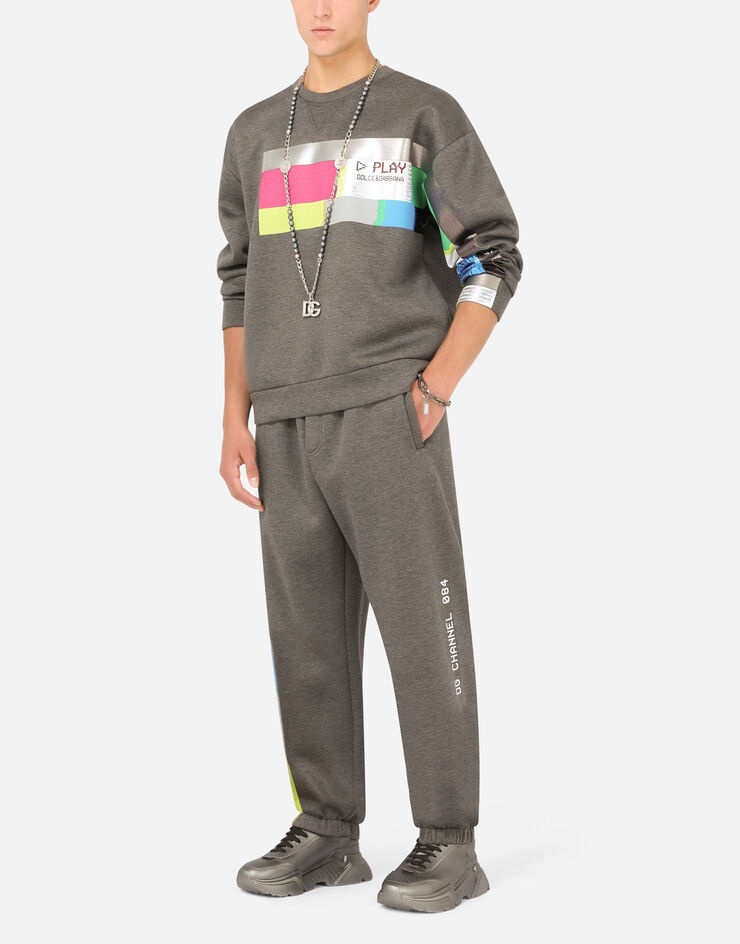 Technical jersey jogging pants with printed band - 6