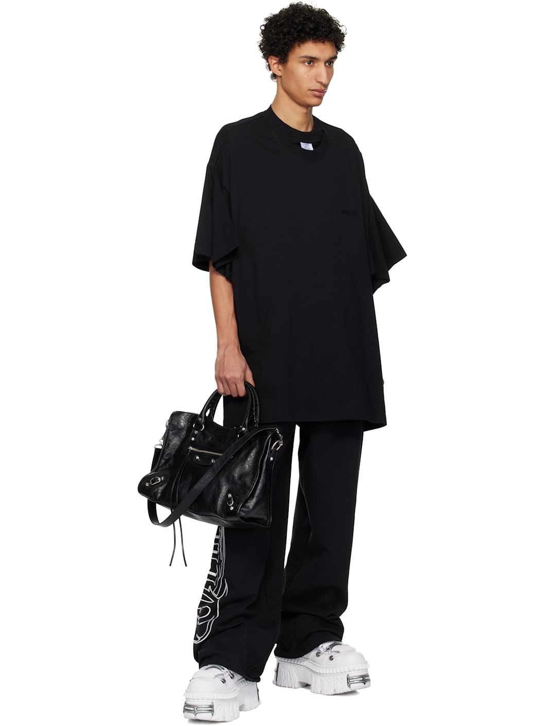 【VETEMENTS】ブラック Merged Double オーバーサイズ Tシャツ VETEMENTS Black Merged Double Oversized T-shirt | REVERSIBLE
