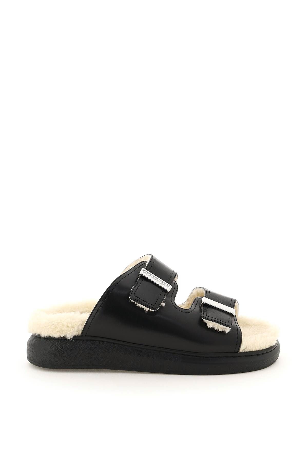 LEATHER AND SHEARLING HYBRID MULES - 1