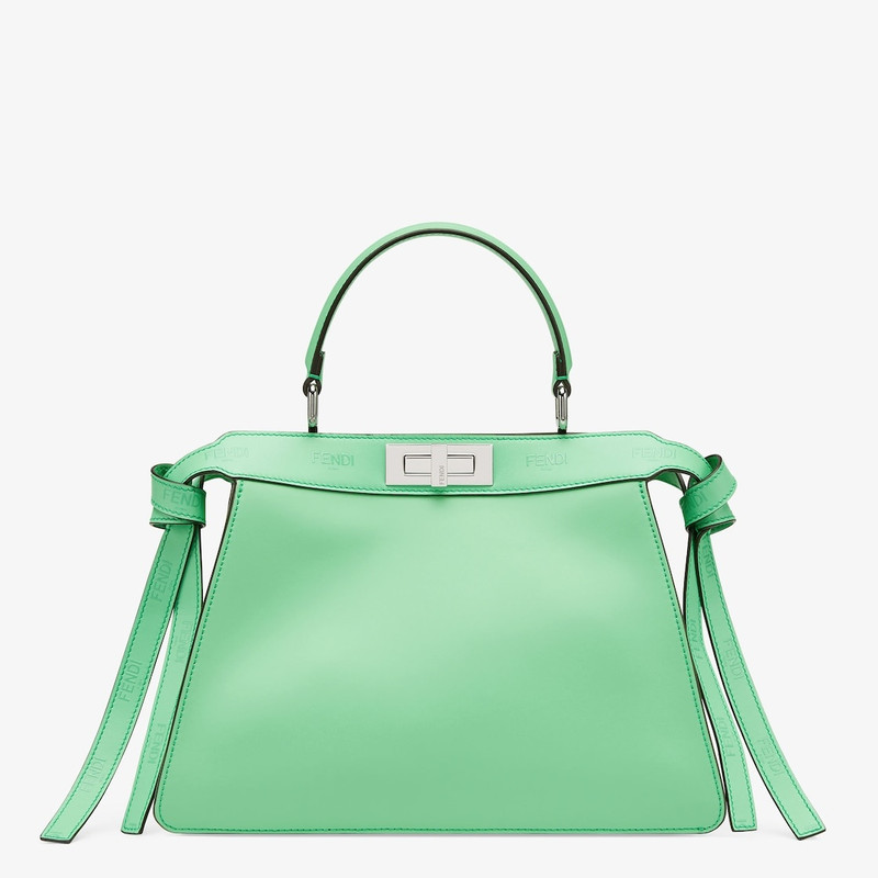 FENDI Iconic medium Peekaboo ISeeU bag, made of green leather with long knotted side laces, printed with a outlook