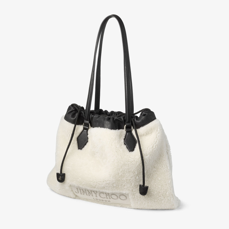 JIMMY CHOO Drawstring Tote Medium
Natural Shearling Drawstring Tote with Leather Trims outlook
