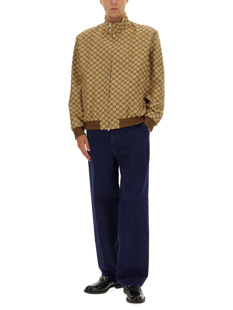 DÉLAVÉ DENIM PANTS WITH EMBOSSED LABEL - 2