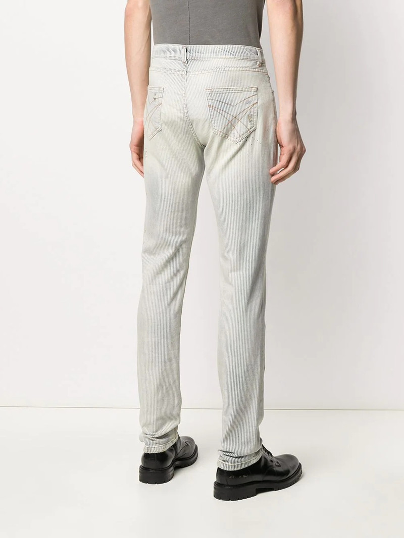 slim-fit stonewashed jeans 4