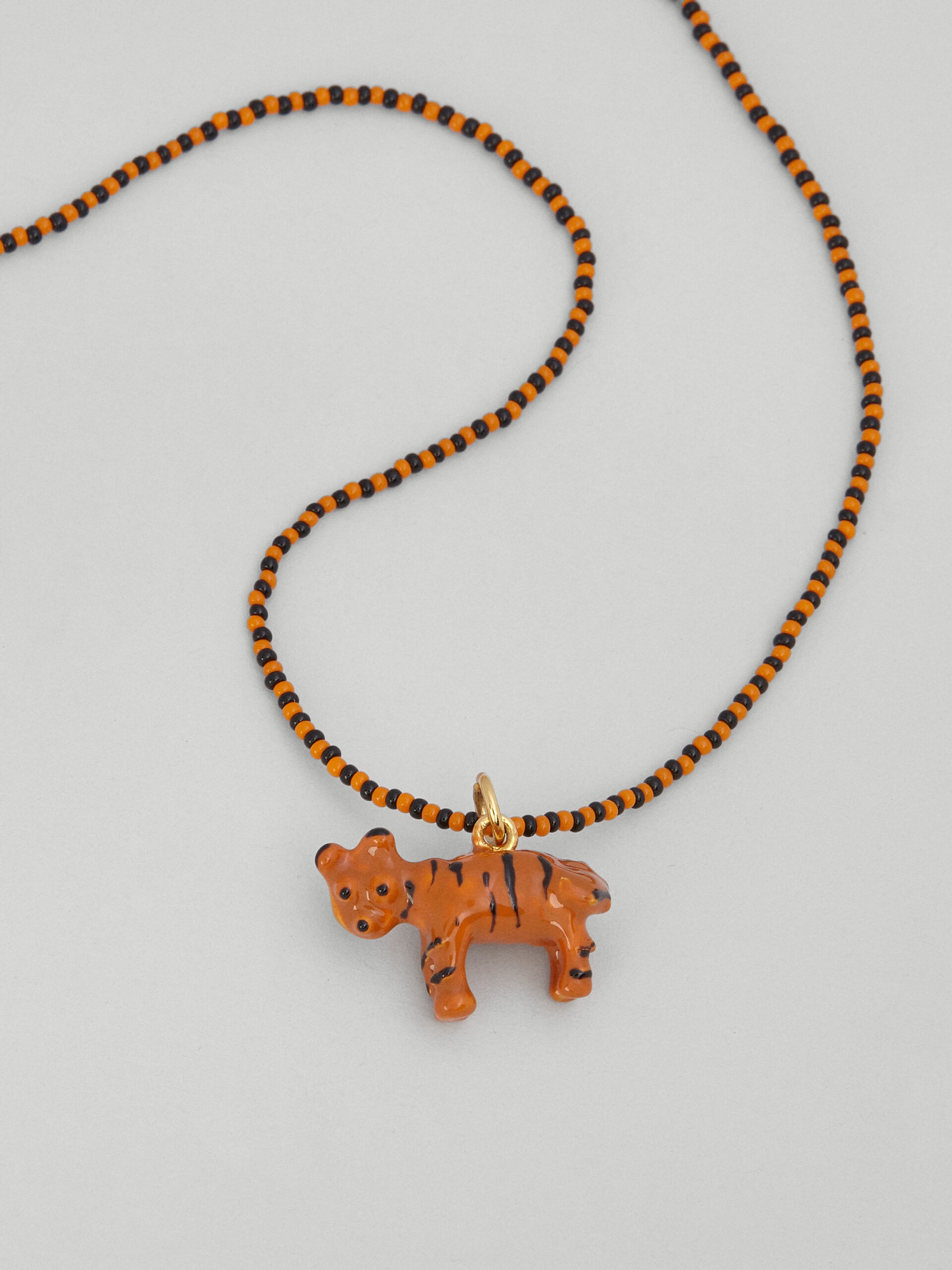 NAIF TIGER NECKLACE IN GLASS AND RESIN - 3