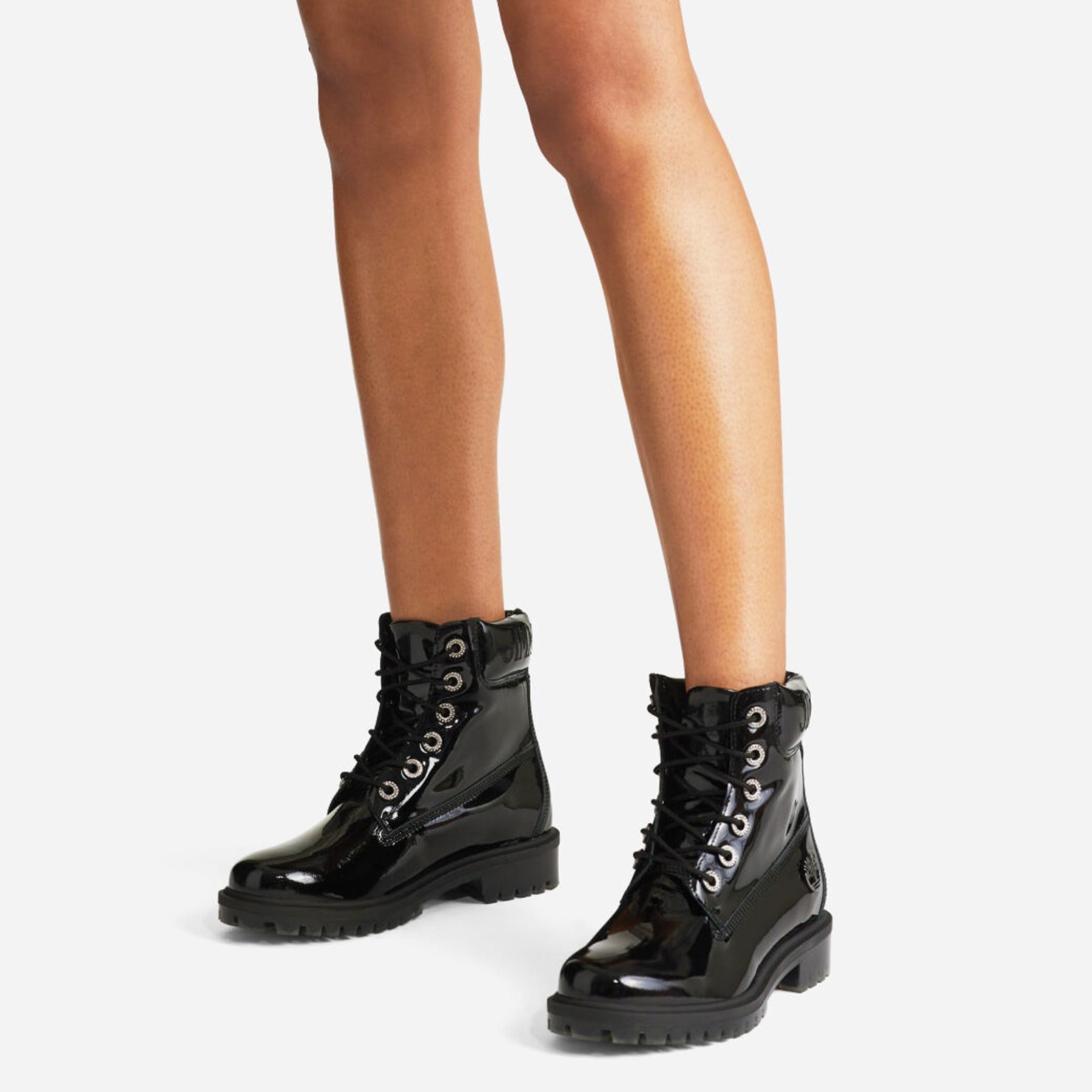 JIMMY CHOO X TIMBERLAND PATENT LEATHER HARNESS BOOT
Black Timberland Patent Knee High Boots with Det - 2
