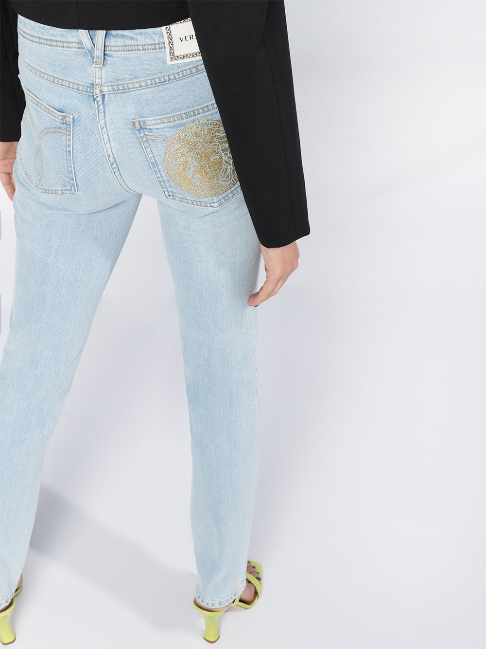 Medusa print skinny jeans - 3