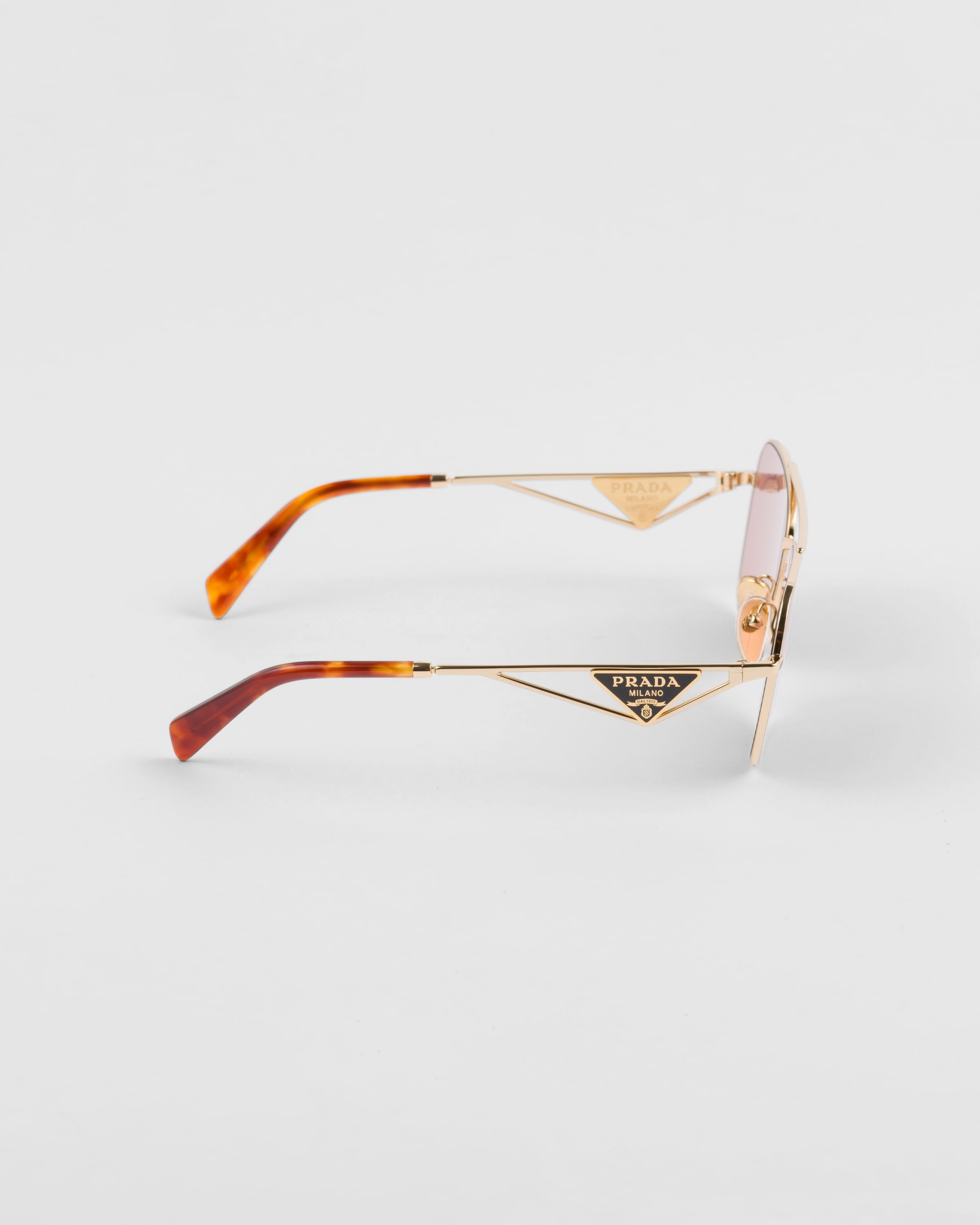 Prada Sunglasses with triangle logo | prada | REVERSIBLE