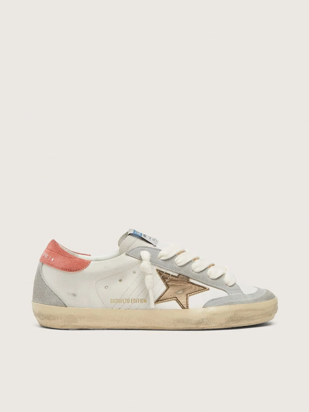 Women's Super-Star LTD in white leather with metallic bronze star - 1