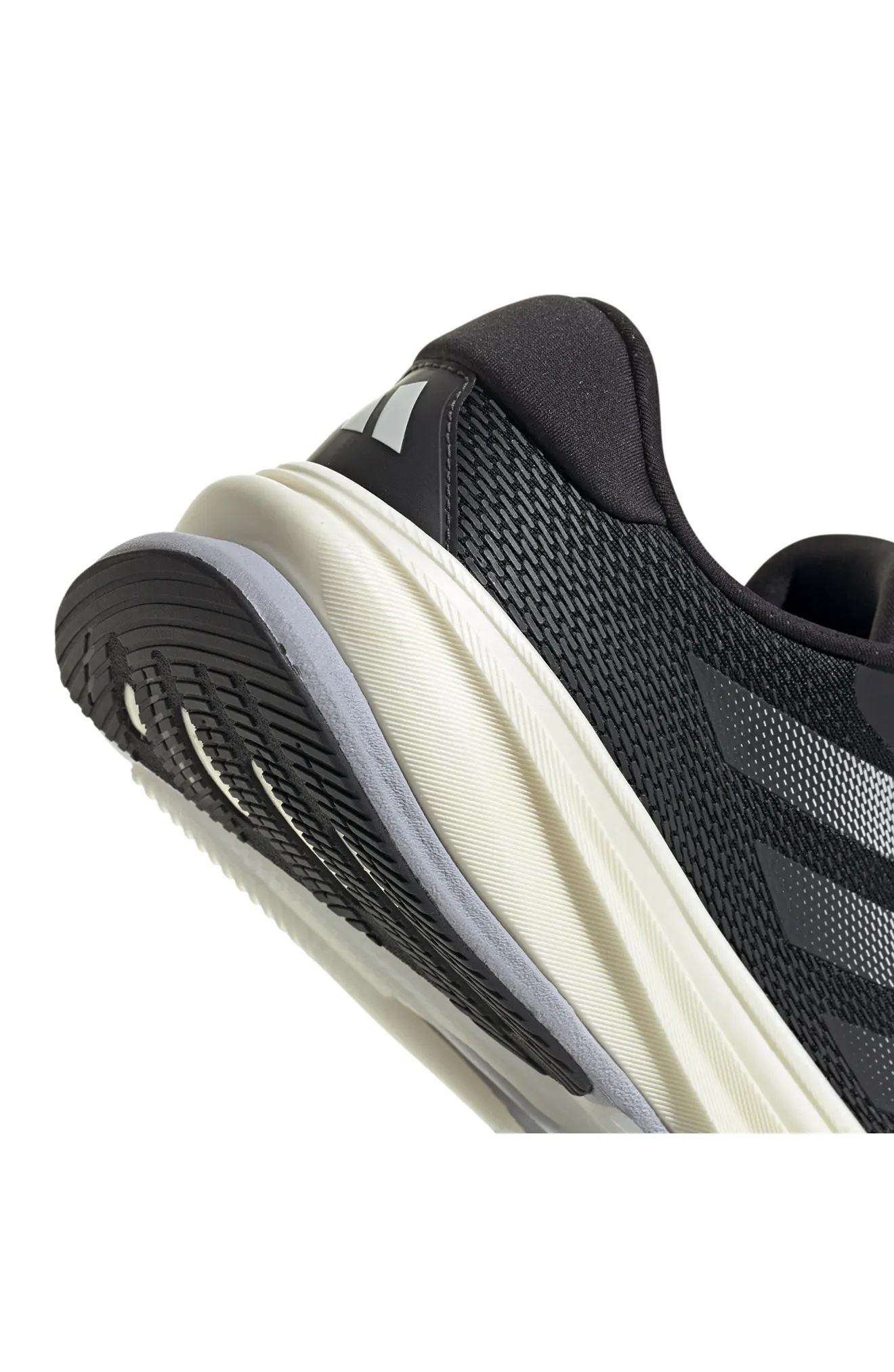 Supernova Rise Running Shoe in Core Black/Core White/Carbon - 10