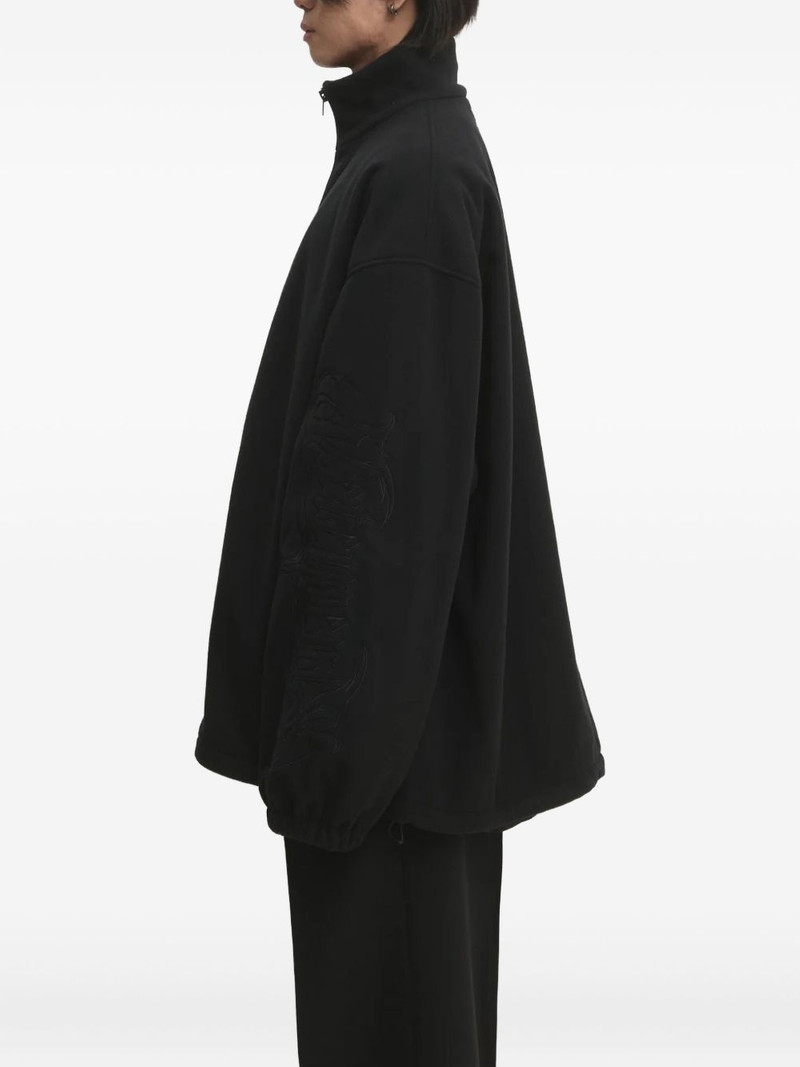 VETEMENTS logo-embossed zip-up jacket outlook